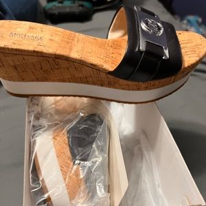 Michael Kors slip on wedges. Brand New women’s size 8.